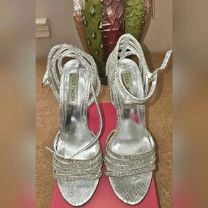 Steve Madden silver size 9, 6" stilettos.